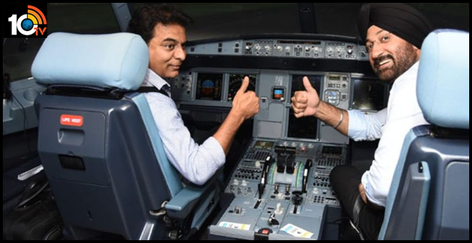 minister ktr having a experience of the flight simulator after inaugurating fstc at shamshabad avr