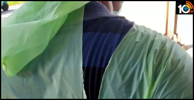 No equipment in sight, doctors fight coronavirus with raincoats, helmets